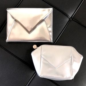 2 la prairie make up bags.